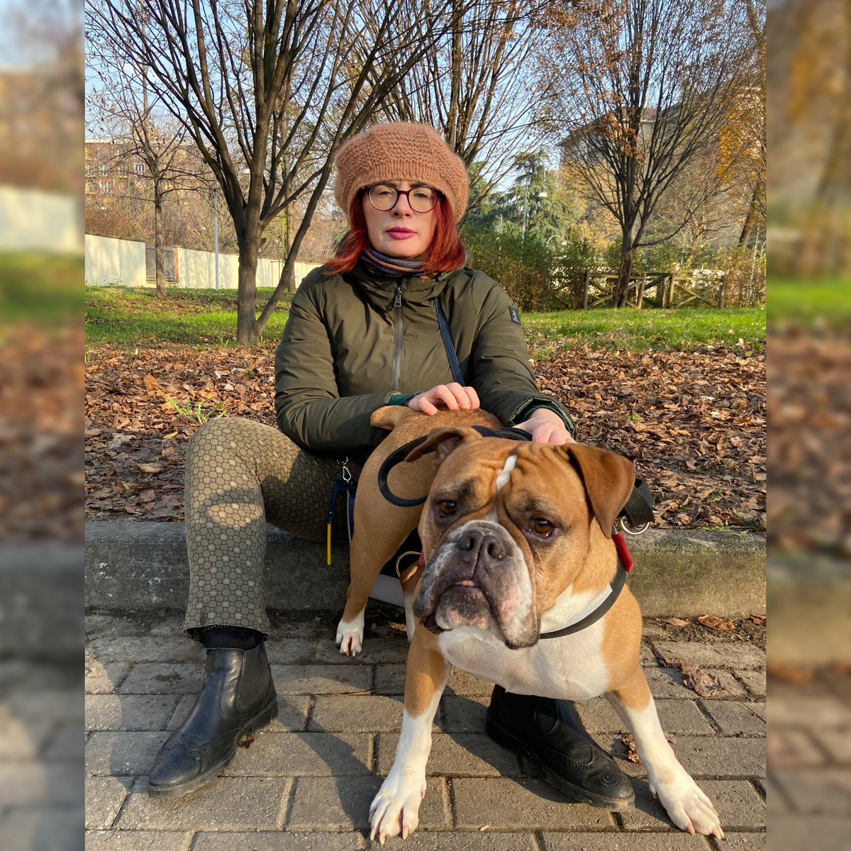 Servizio di Pet Sitting a Torino, daniela larivei con bulldog americano nel parco, orme differenti